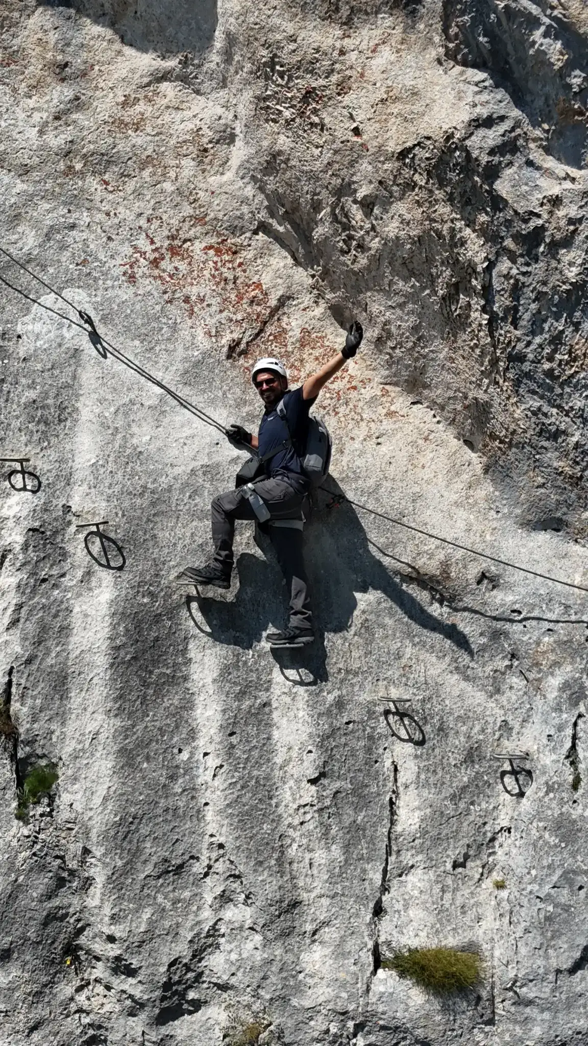 A wave for the drone from the rungs on the open slab.