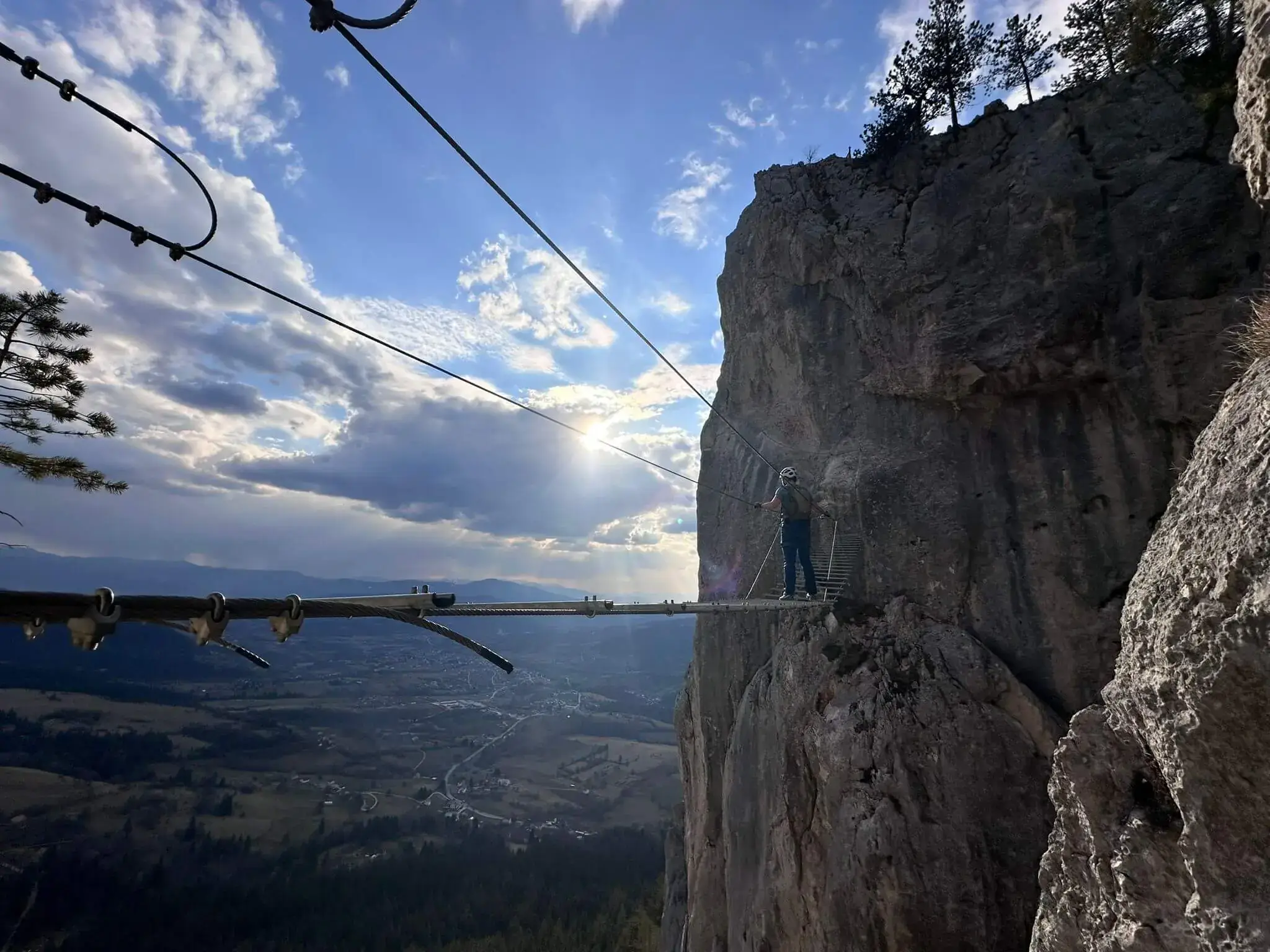 Suspension bridge beside the limestone cliffs of Sokolov Put on Romanija