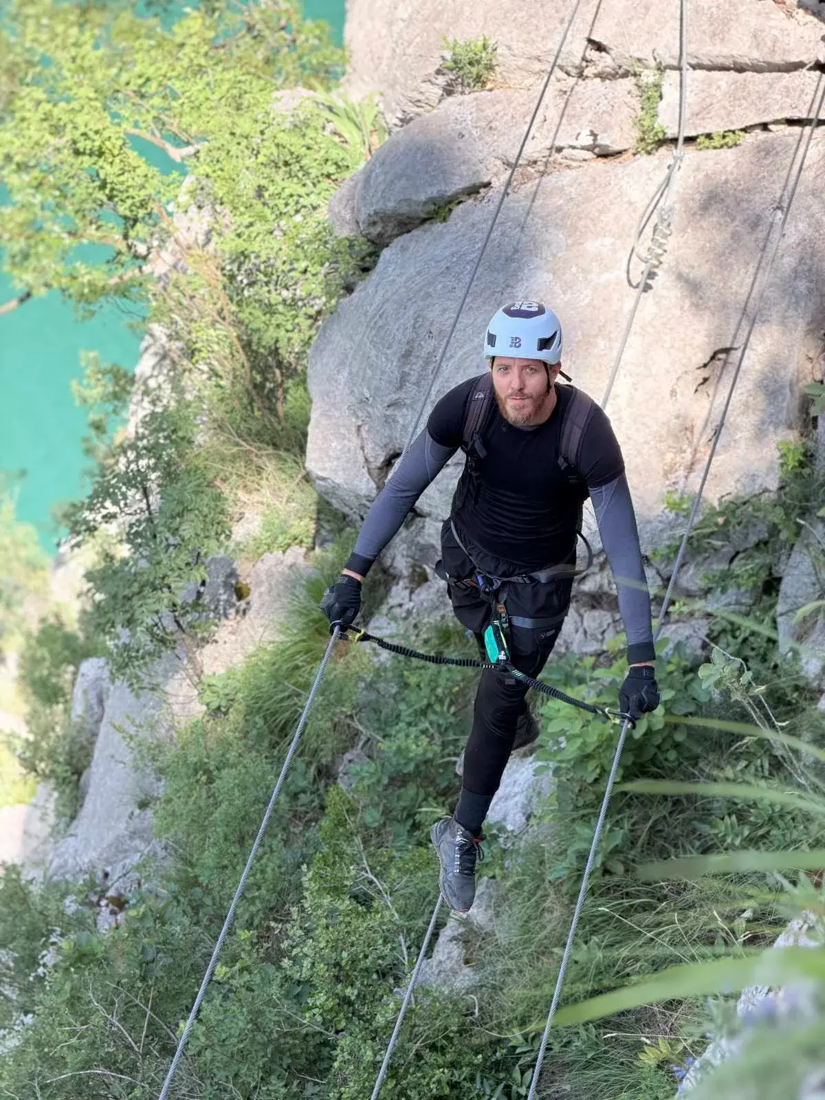 Nermin, BOA guide based in Sarajevo, on a via ferrata bridge