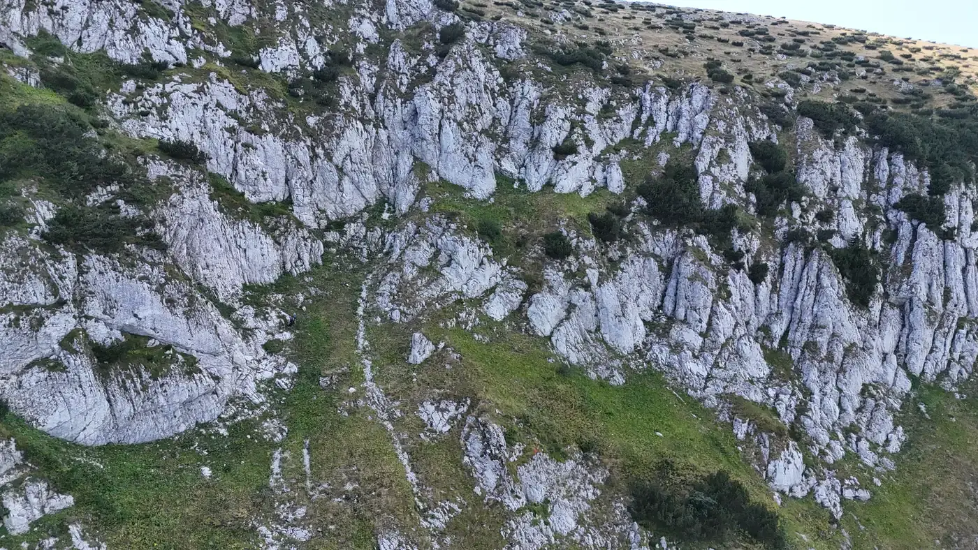 The limestone wall the Kotlovi via ferrata climbs, seen from the drone